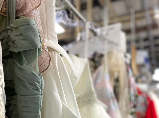 Inside look into the countless dresses that we receive each day.